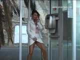 016163 Eve Pees In The Phone Booth