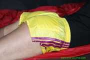 Watch Pia in her special yellow shiny nylon Shorts