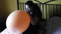 giant balloon in the bed