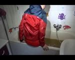 Mara wearing a sexy shiny nylon shorts and an odlschool rain jacket while taking a bath in mud (Video)