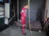 Watch Sandra bound gagged and noosed wearing her shiny nylon Rainwear