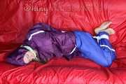 SANDRA being tied and gagged on a sofa with ropes and a clothgag wearing a sexy blue shiny nylon rain pants and a purple rain jacket  Part 2 (Pics)