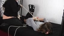 Cindy on the bed hogtied 1/2