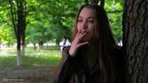 Beautiful Ksenia is smoking cork 100mm cigarette