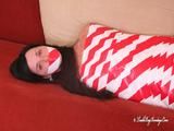 [From archive] Marvita mummified in red and white duct tape