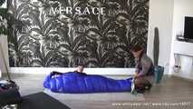 Mercy - being caught in the blue shiny nylon sleepingbag