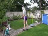 Get a video with Chloe enjoying gardening in her shiny nylon Shorts