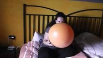 giant balloon in the bed