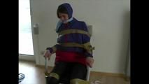 3sets of short videos with Katharina tied and gagged and hooded on a chair wearing shiny nylon rainwear (Video)