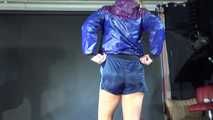 Watching sexy Pia wearing a sexy oldschool blue shiny nylon shorts and a rain jacket during her workout (Video)