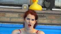 Natalie Titkoja cool off in a pool 