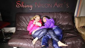 SANDRA and STELLA making fun with eachother both wearing sexy shiny nylon downwear (Pics)