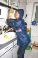 Stella tied, gagged and hooded in the kitchen wearing supersexy blue rainwear (Pics)