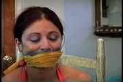34 YEAR OLD HOTEL MANAGER IS CLEAVE GAGGED, TAPE GAGGED, HANDGAGGED, MOUTH STUFFED, OTM DOUBLE GAGGED, GAG TALKING, BAREFOOT, TOE-TIED WHILE TIGHTLY TIED TO A CHAIR (D73-18)