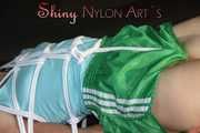 PART TWO - SEXY SONJA being tied and gagged with ropes and a clothgag wearing a sexy green shiny nylon shorts and a blue shirt (Pics)