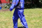 Mara playing soccer in the sun wearing a blue rainwear combination (Pics)
