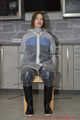 Miss J ziptied in raingear and gagged with stuffed mouth and secured clave gag