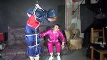 Ronja tied and gagged by stella in shiny nylon rainwear 