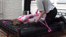 Tight hogtie with pink ropes
