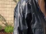 Watch Chloe gardening in her shiny nylon Rainwear