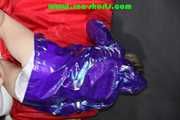 Sexy Sonja wearing a sexy shiny nylon shorts and a special rain jacket preparing her sofa for lolling (Pics)
