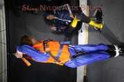 See Ronja tied and gagged by Stella in shiny nylon Rainwear and a Life Vest!