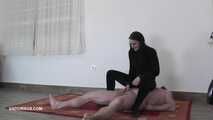 Mistress Dyanna gives the slave a painful gift