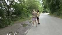 032049 Sam & Carmen Pee Into A Roadside Puddle