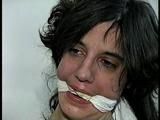 26 Yr OLD K-MART CLERK IS HANDGAGGED, MOUTH STUFFED, CLEAVE GAGGED TIT TIED, CROTCH ROPED PUSSY, OTM GAGGED WITH LEATHER STRAP, DROOLING, WHILE TIGHTLY TIED NAKED TO A CHAIR (D66-2)