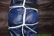 Watch Pia enjoying her shiny nylon Rainwear