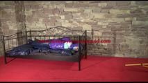 Mara tied and gagged on a princess bed in an old cellar wearing a sexy purple/blue downwear combination (Video)