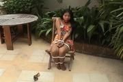 Video: Hot Evening Outside. Cute Asian Girl is Tied to the Chair Outside and Exposed for You.