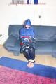 Jill tied, gagged and hooded wearing shiny nylon rainwear (Pics)