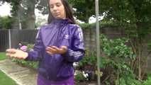 Watching Aiyana wearing a sexy purple shiny nylon shorts and a purple rain jacket while taking a shower in the garden (Video)