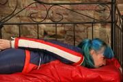 Mara tied, gagged and hooded on a princess bed wearing sexy oldschool downwear in blue/red/white (Pics)