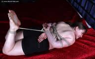 Lesa - hogtied and tickled on bed