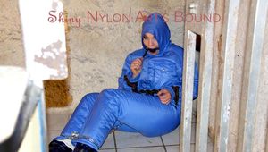 Jill tied, gagged anmd hooded with old handcuffs lying in an old cellar wearing a sexy lightblue skibib (Pics)