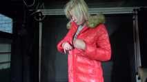 Watching sexy Pia puttng on a special red down jacket (Video)