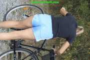 Watch Sandra riding her bike enjoying her shiny nylon shorts