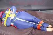 ***HOT HOT HOT*** SANDRA tied with ropes on the floor, gagged with a cloth gag wearing a sexy blue oldschool shiny nylon down suit (Pics)