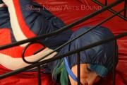 Mara tied, gagged and hooded on a princess bed wearing sexy oldschool downwear in blue/red/white (Pics)