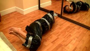 [From archive] Vijaya - Hogtaped in trash bag (video)