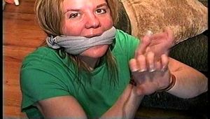 38 Yr OLD SOCIAL WORKER GETS HANDGAGGED, MOUTH STUFFED, CLEAVE GAGGED, TIED WITH RAWHIDE, WRITES RANSOM NOTE, WRAP BONDAGE TAPE GAGGED AND GAG TALKS 