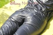 Mara sunbathing and swimming in the pool wearing a supersexy black adidas shiny nylon rainwear (Pics)