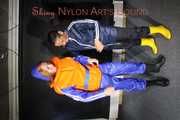 See Ronja tied and gagged by Stella in shiny nylon Rainwear and a Life Vest!