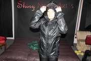 Watching sexy Sandra putting on several layers of shiny nylon rainwear including hoods and enjoy the feeling (Pics)