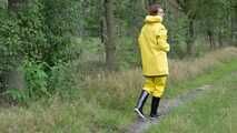 Miss Petra goes for a walk in friesennerz, yellow rain dungarees and rubber boots (looped version)