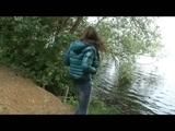 Alina walking on a lake wearing sexy shiny nylon shorts under her jeans and a down jacket (Video)