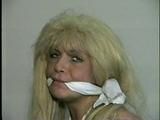 BLONDE BOMBSHELL TRACY IS SPONGE STUFFED AND CLEAVE GAGGED (D36-8)