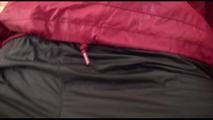 Jill tied, gagged and hooded on a sofa wearing sexy shiny black rain pants and an oldschool red rain jacket (Video)